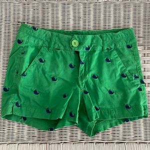 Cute green shorts with blue whales